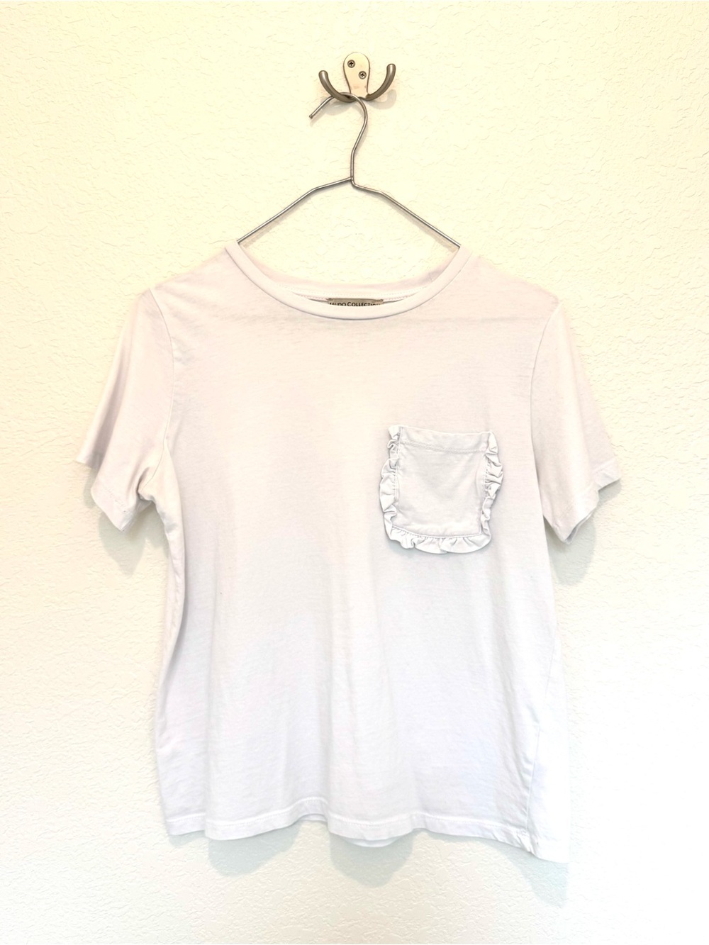 Mudo Collection White Ruffle Pocket Tee